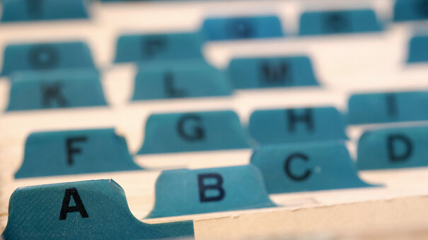 Business cards indexed and organized for communications and contacts or leads for sales to clients