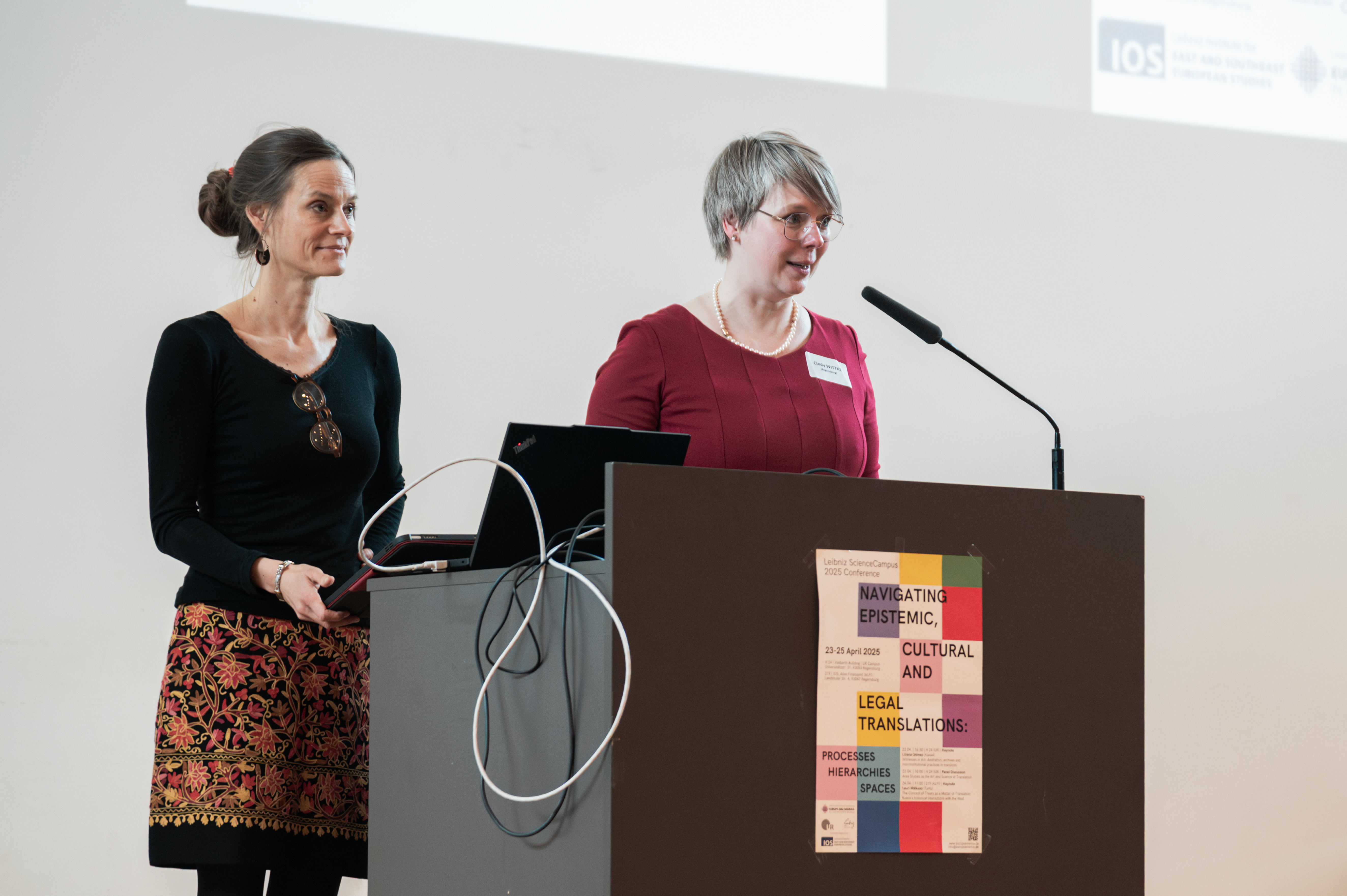portrait of Prof. Anne Brüske and Prof. Cindy Wittke at the lectern during the LSC Conference